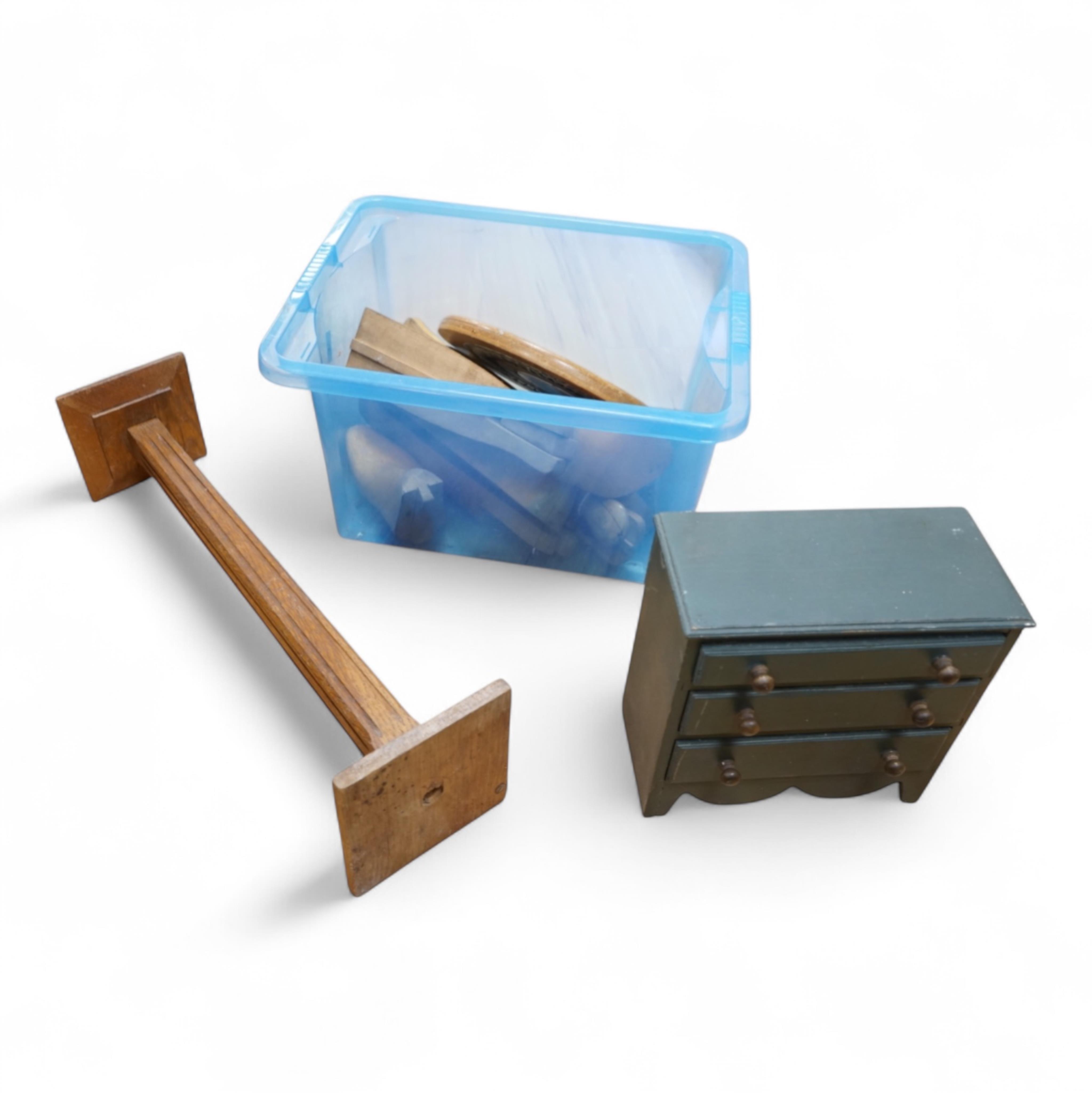 A painted pine miniature chest of drawers, various boot trees etc, chest 26cm x 26cm